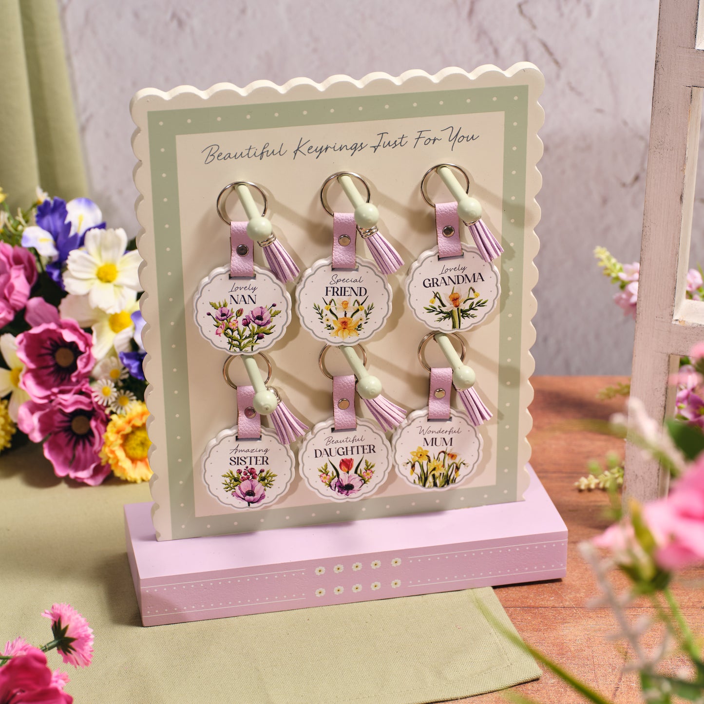 FLORAL SERENADE SCALLOPED WOOD FEMALE FAMILY TASSEL KEYRING