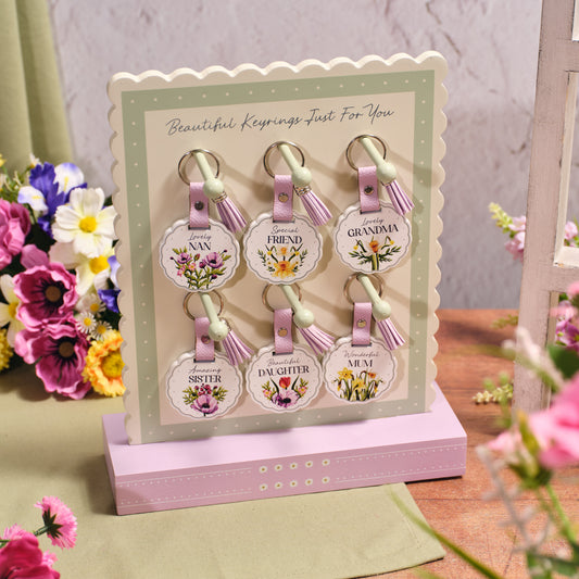 FLORAL SERENADE SCALLOPED WOOD FEMALE FAMILY TASSEL KEYRING
