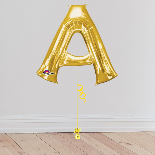 <b> ONLINE EXCLUSIVE </b> <br>Giant Gold Letter Balloon <br>(Inflated with Helium & Weight Included)