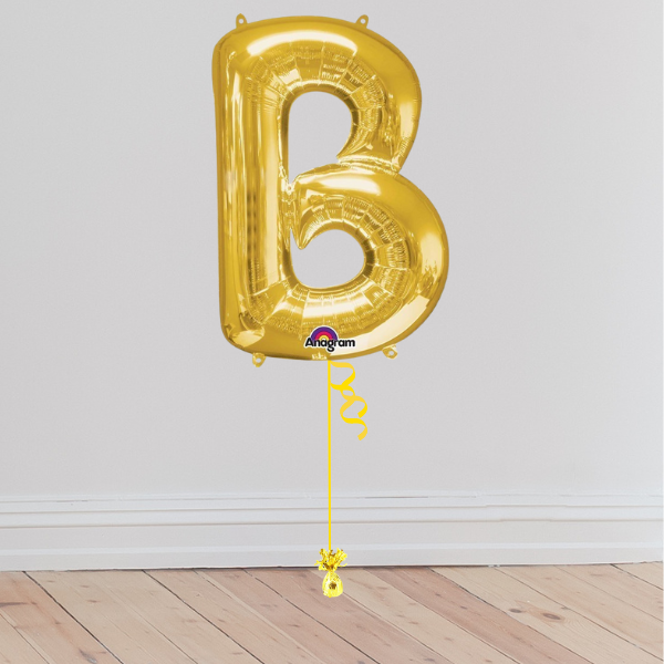ONLINE EXCLUSIVE Giant Gold Letter Balloon Inflated with Helium Weight Included