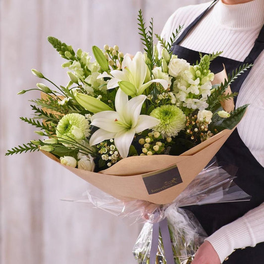 Sympathy hand-tied made with the finest flowers