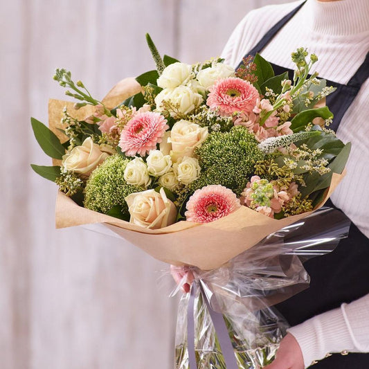 Sympathy hand-tied made with the finest flowers