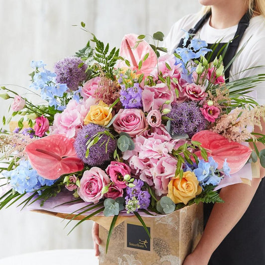 Hand-tied bouquet made with the finest flowers