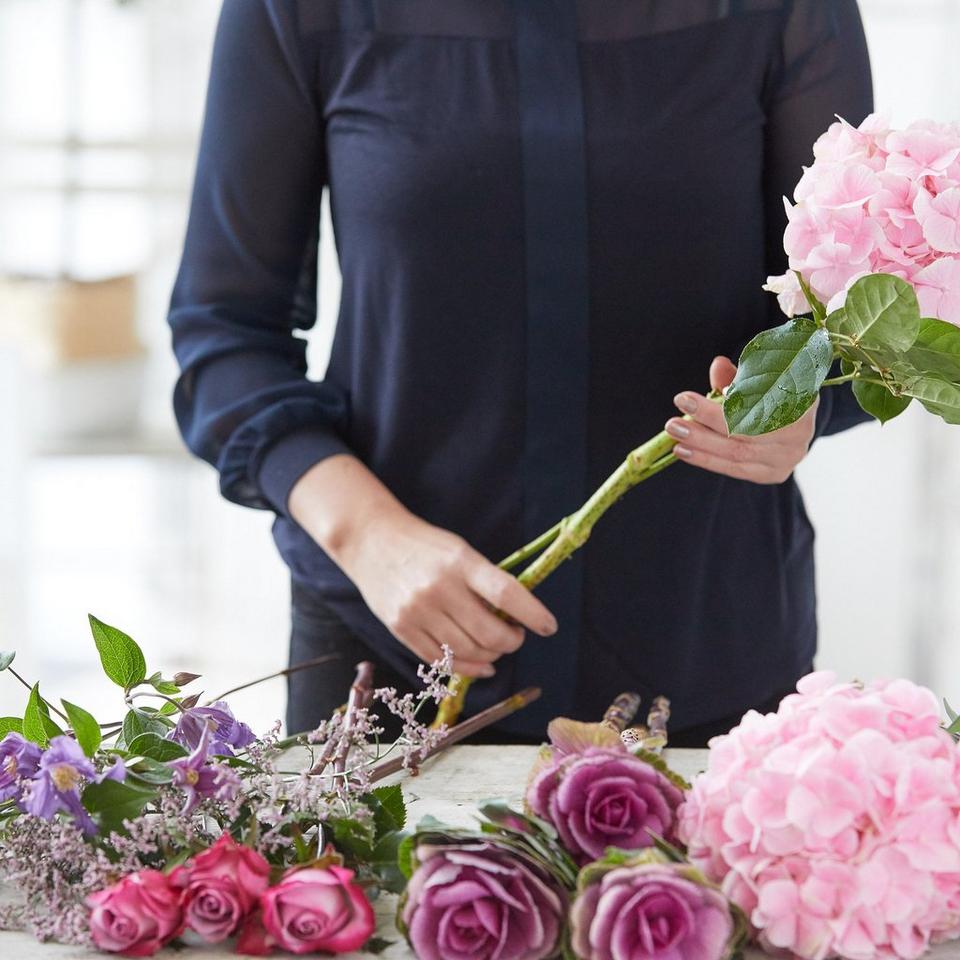 Service arrangement tribute made with the finest flowers